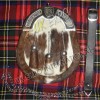 Brown and white cow hide skin with Rampart Lion Shield Metal Badge